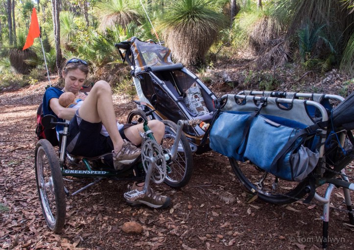 Stopping to feed Bryn.  The trike works well to keep things comfortable.  The Big Dummy hauling the trailer (very slowly at times - to avoid too much rattling) and gives plenty of carrying options for all that you might need.