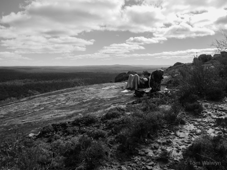 Sullivan Rock - not far from the road, but the distinction's lost on Bryn who's decided that it's meal-time.