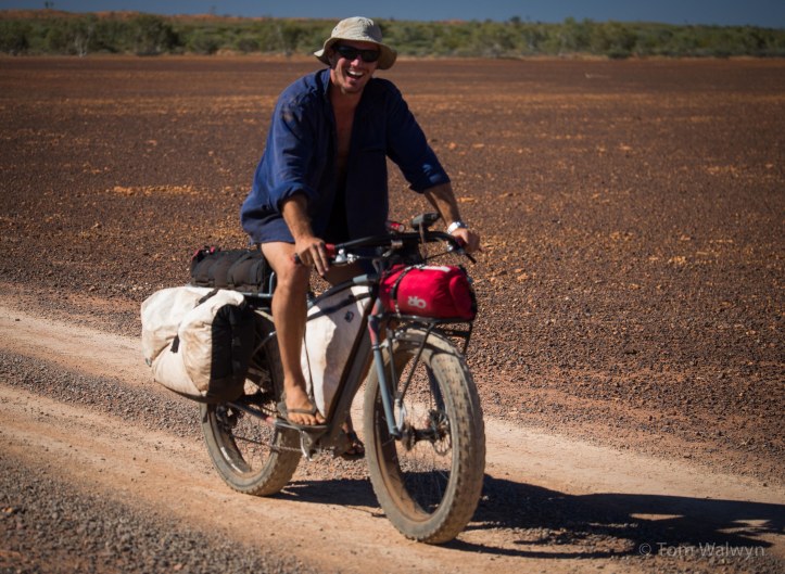 Happiness is a bicycle - Scott hires his bike out in exchange for a beer in the middle of Gravity Lake