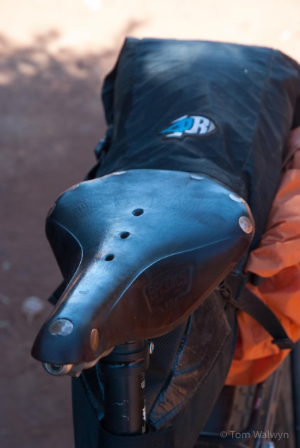 No worse for all the wear it had suffered.  Both of us used leather saddle - mine a Brooks B17 and Scott's a Sella Anatomica.  With the heat, the smoother surface helped reduce abrasion.  We would both recommend padded bicycle shorts after our experience of the corrugations.