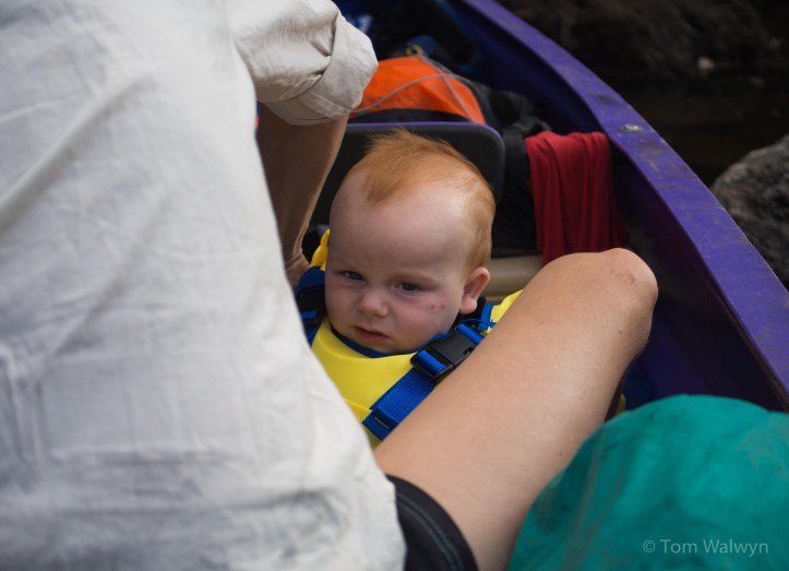 After a bit of river-bank sorting, Bryn is loaded up - initially less than impressed, particularly with his new life jacket.