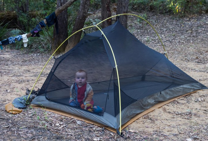 Being parked in a tent away from bitey things seems somewhat lost on Bryn