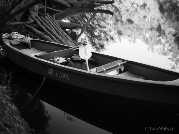 Our canoe for the trip is a pretty solid and stable plastic one borrowed from Sarah's sister's front yard
