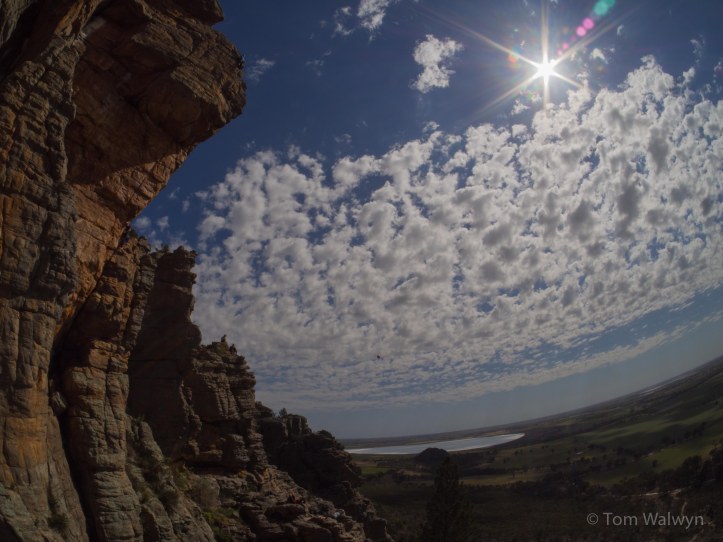 with a famed and expansive vista to settle the nerves of prospective assailants .  A small blue-shirted speck nearing the top was Rob (still the second of that name).