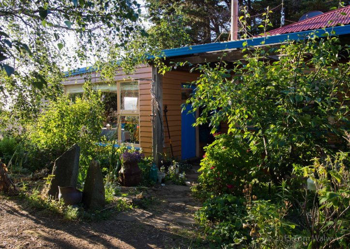 The main house's half buried in kitchen garden
